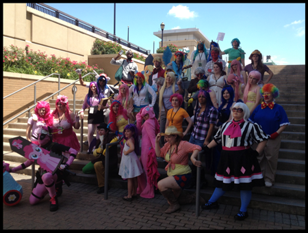 a photo of many cosplayers dressed as My Little Ponies