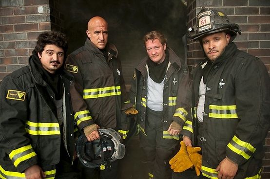 Chicago Fire a promotional image of firefighters from the television show Chicago Fire